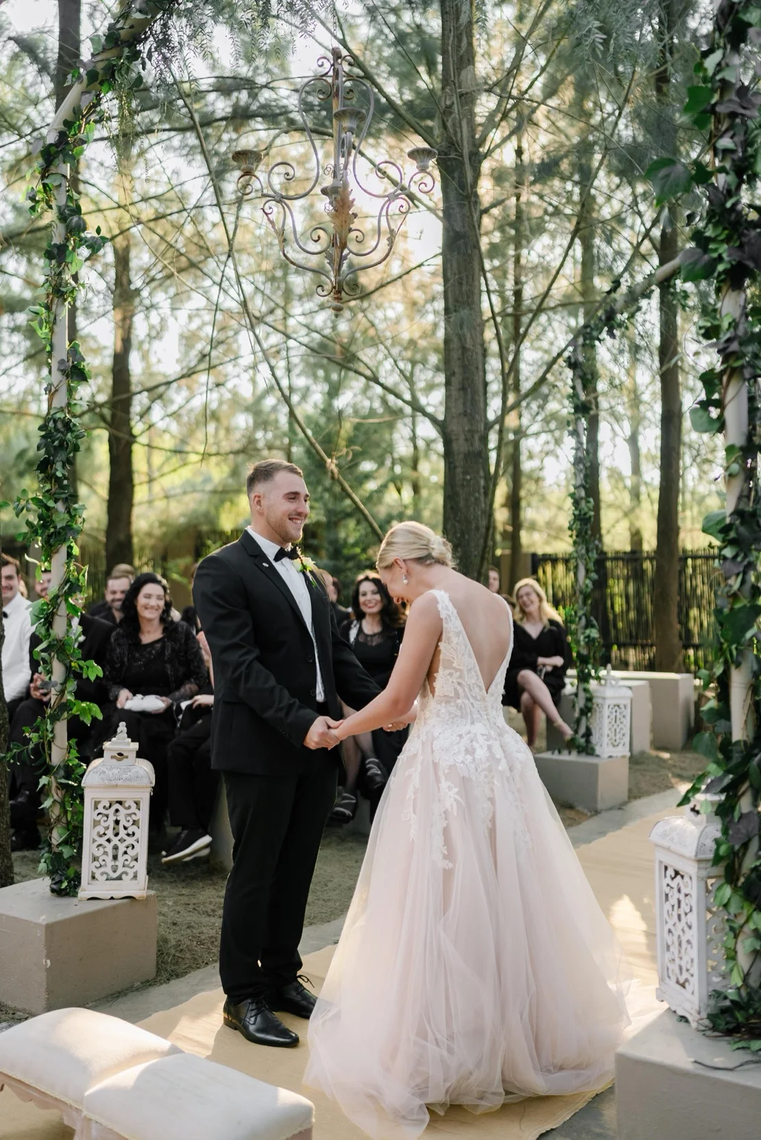 Bride and groom holding hands during their vows, Pretoria wedding